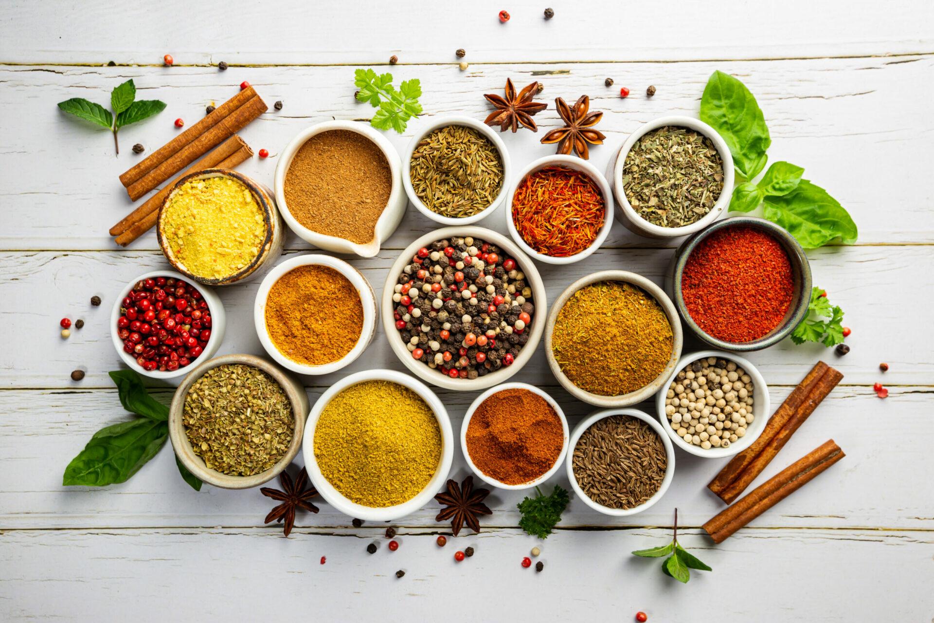 Various herbs and spices in bowls