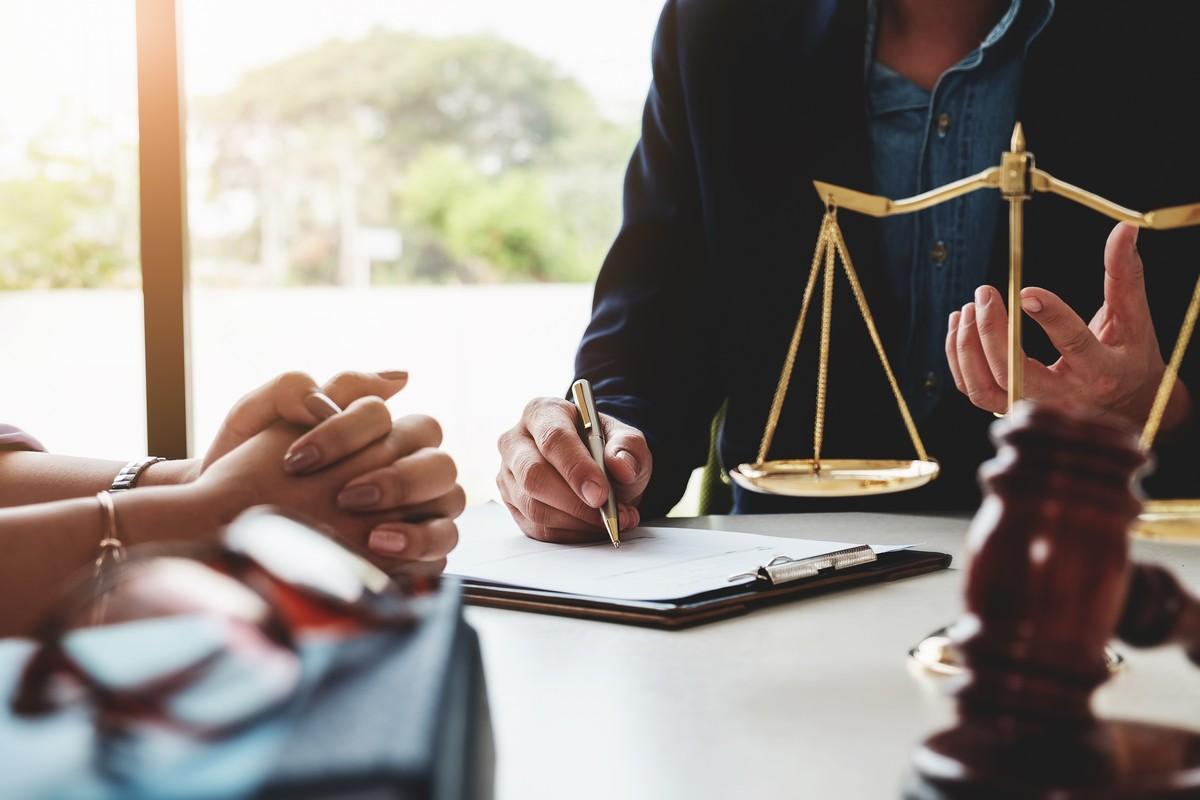 Lawyer outlining the court case strategy to the client.